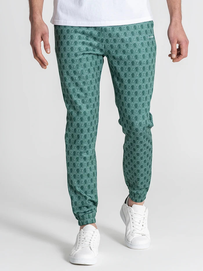 CALÇAS JOGGER VERDES PADRÃO MONOGRAMA PONTO CHIC
