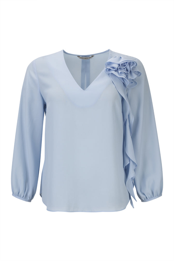 BLUSA AZUL CLARO COM FLOR SILVINA CAMPOS
