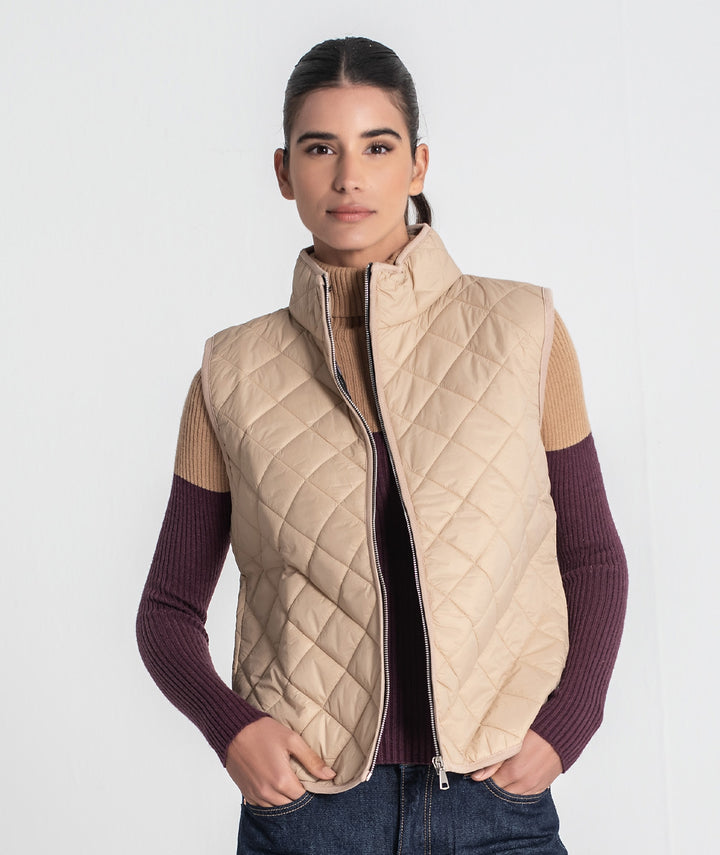 COLETE ACOLCHOADO BEGE COM INTERIOR ESTAMPADO RUGA