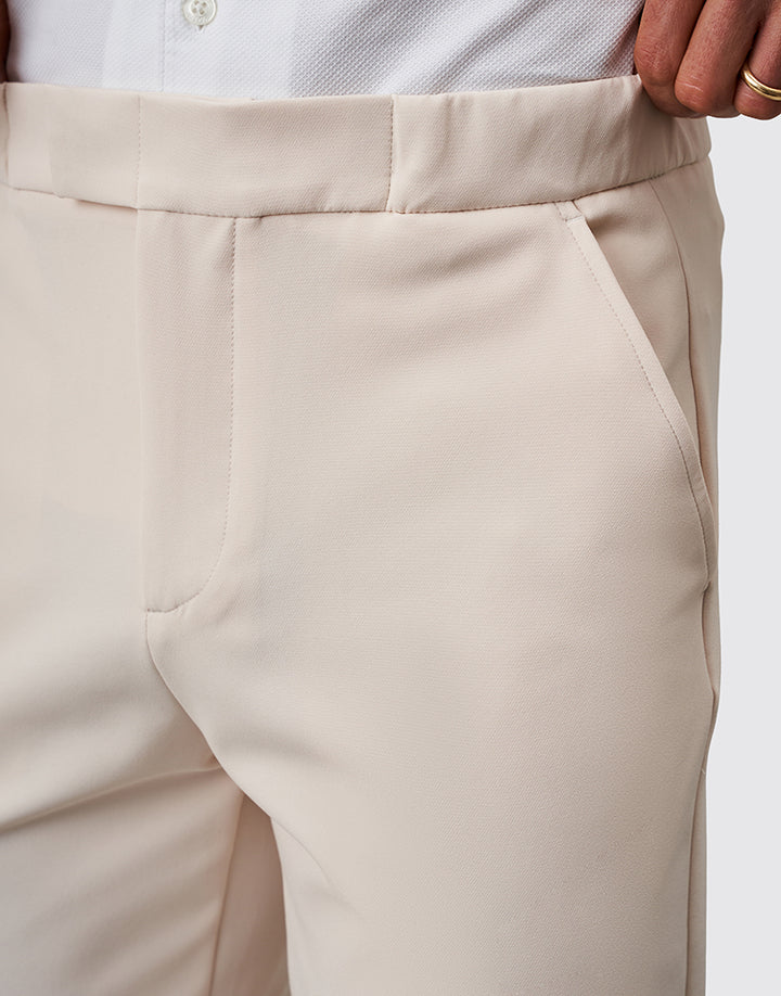 CALÇA COM TECIDO TÉCNICO RELAXED FIT BEGE ZOLF