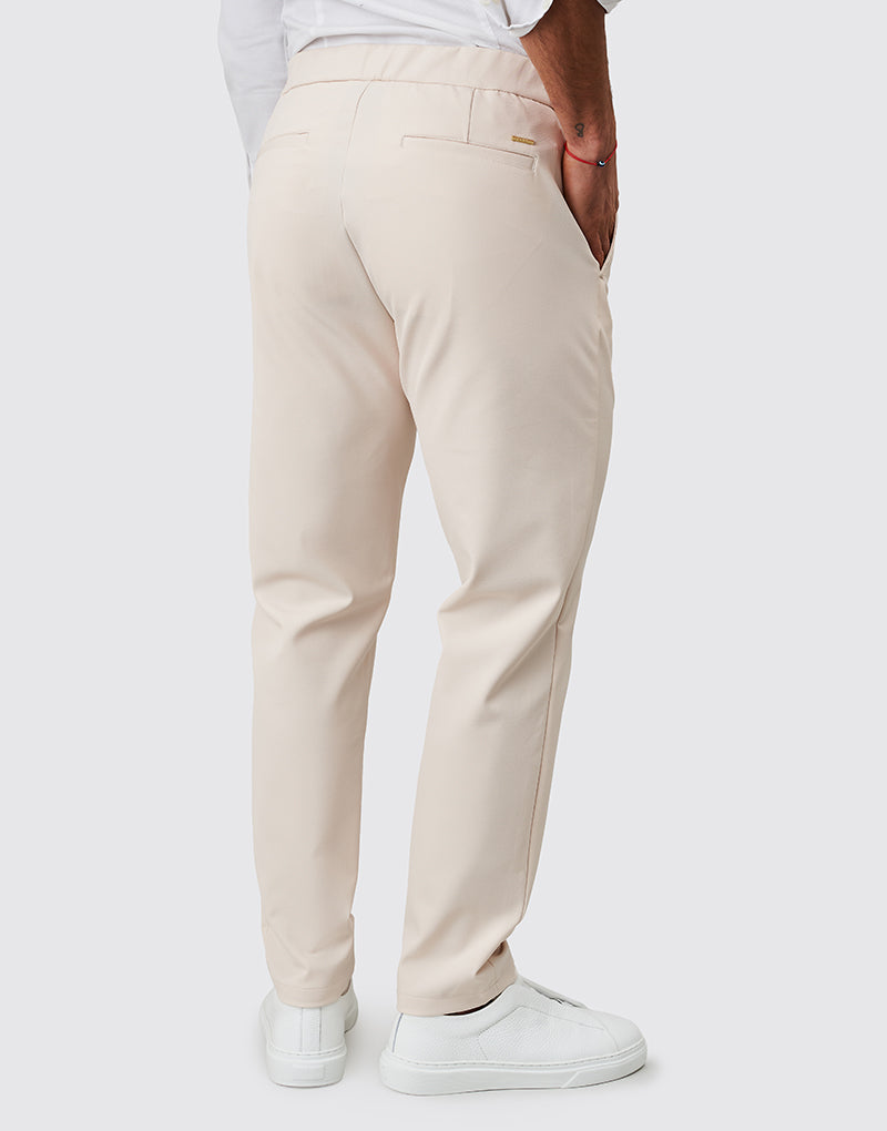 CALÇA COM TECIDO TÉCNICO RELAXED FIT BEGE ZOLF