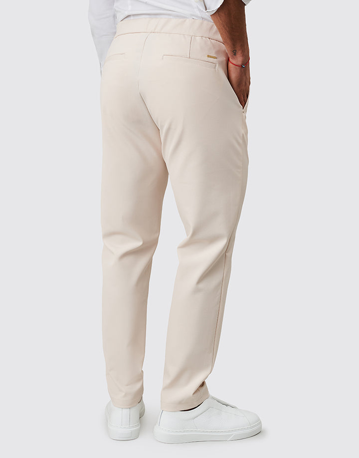 CALÇA COM TECIDO TÉCNICO RELAXED FIT BEGE ZOLF