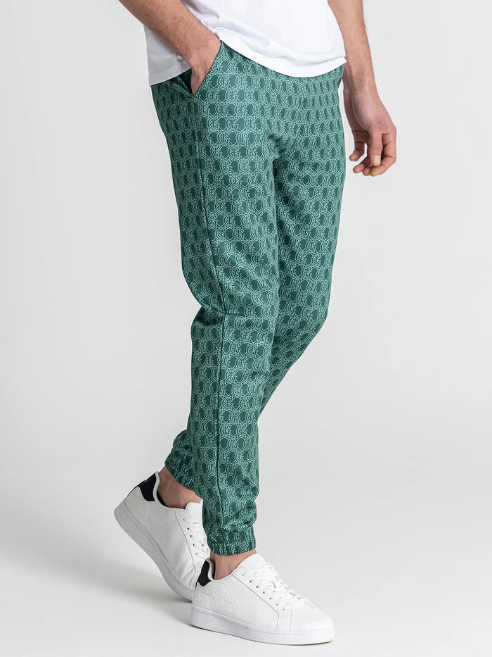 CALÇAS JOGGER VERDES PADRÃO MONOGRAMA PONTO CHIC