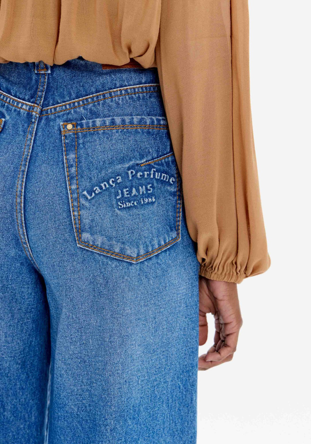 CALÇA JEANS COM NERVURA LANÇA PERFUME