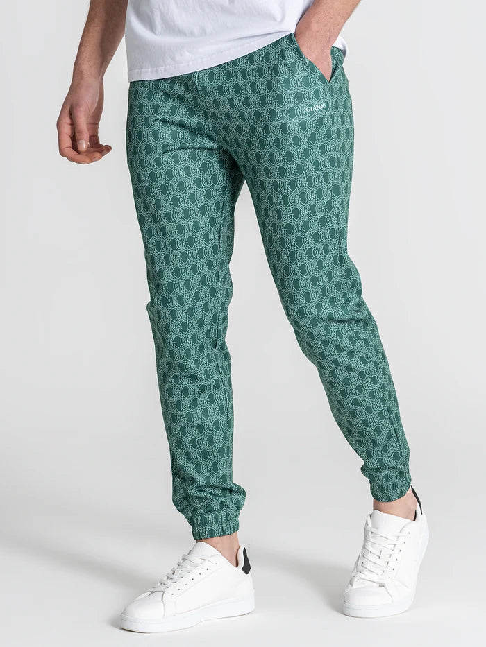 CALÇAS JOGGER VERDES PADRÃO MONOGRAMA PONTO CHIC