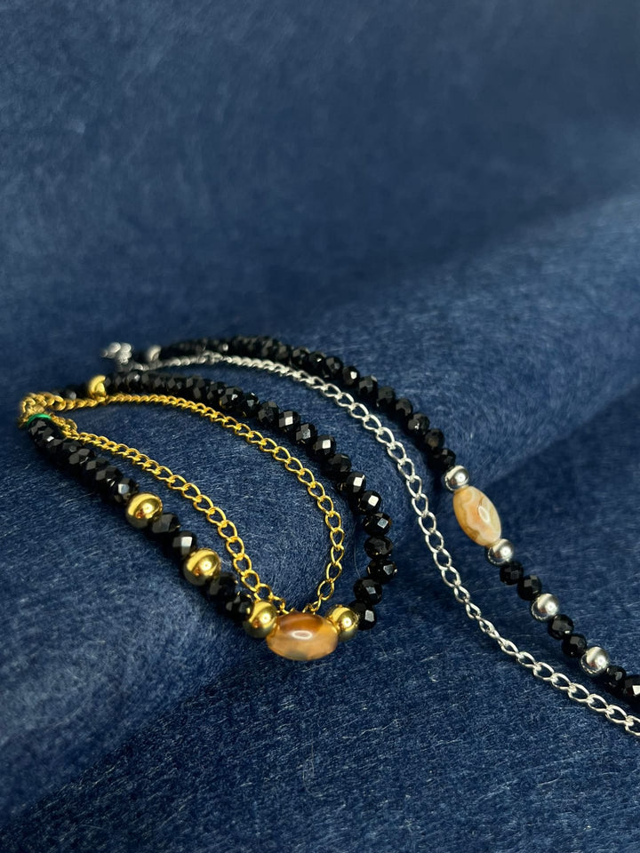 PULSEIRA DUPLA PRATA E PRETA PONTO CHIC