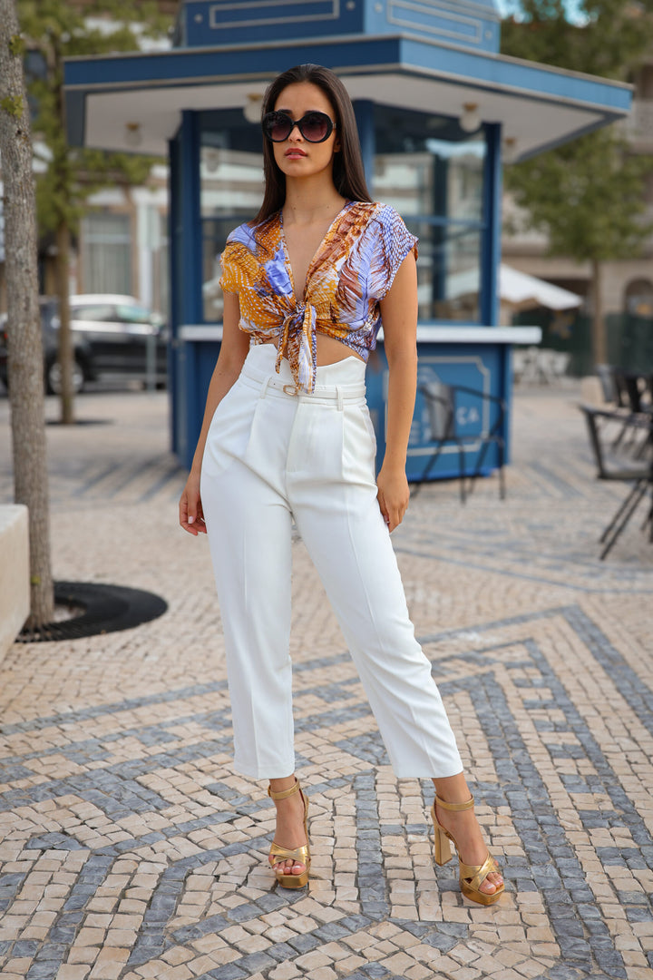 BLUSA ESTAMPADA COM NÓ RUGA