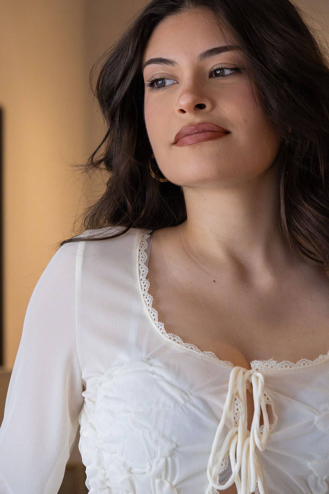 BLUSA DRAPEADA COM FRANZIDOS E ATILHAMENTO FRONTAL PONTO CHIC