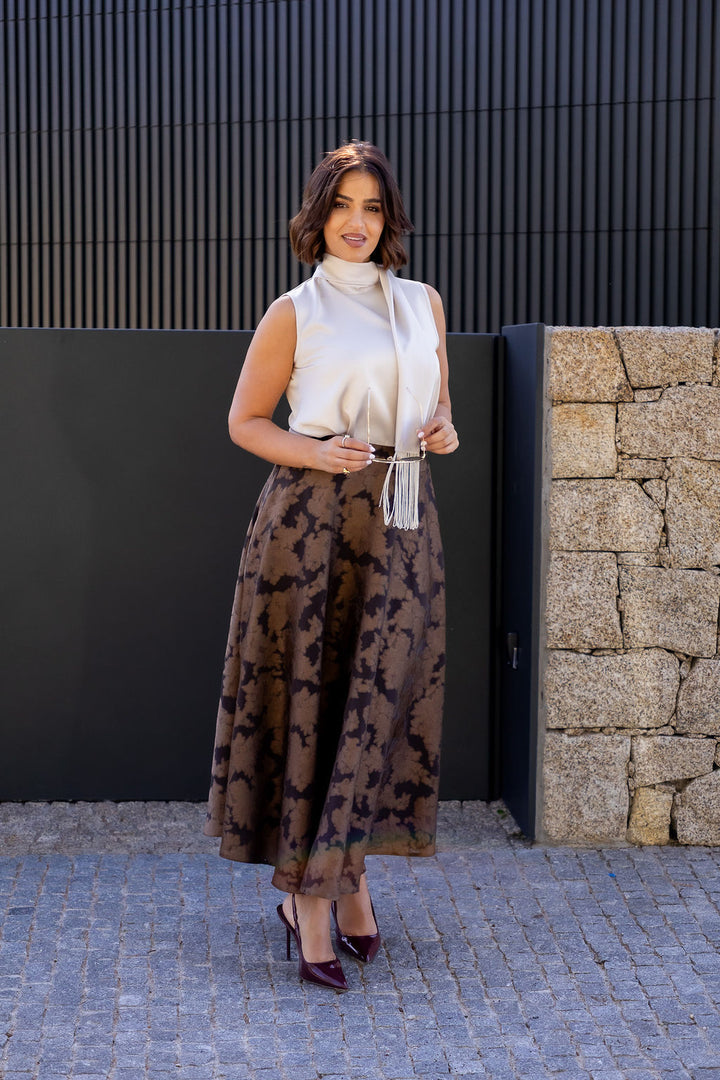 BLUSA BEGE COM GOLA PROLONGADA E FRANJAS RINASCIMENTO