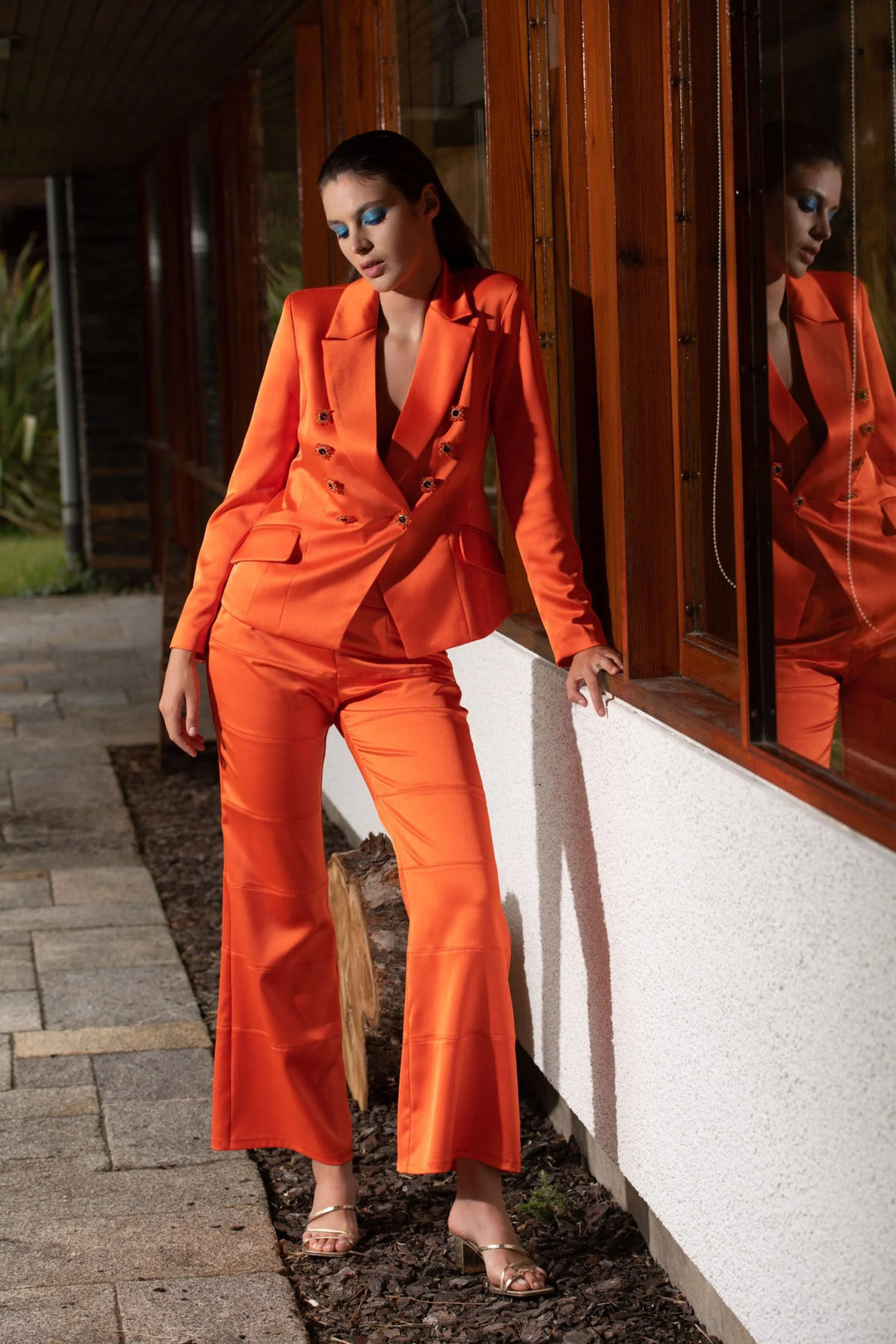 CALÇA LARANJA FLUIDA COM COSTURAS LOCO LUXO