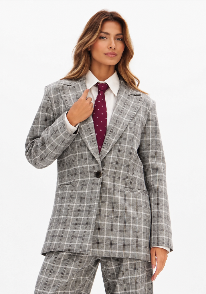 BLAZER CINZA AOS QUADRADOS LANÇA PERFUME