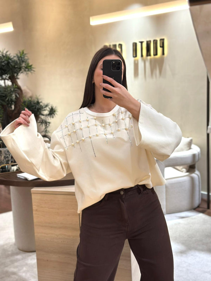 SWEATSHIRT BEGE COM APLICAÇÃO DE PÉROLAS LANÇA PERFUME