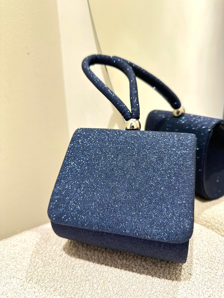 MINI CLUTCH AZUL COM ACABAMENTO CINTILANTE PONTO CHIC