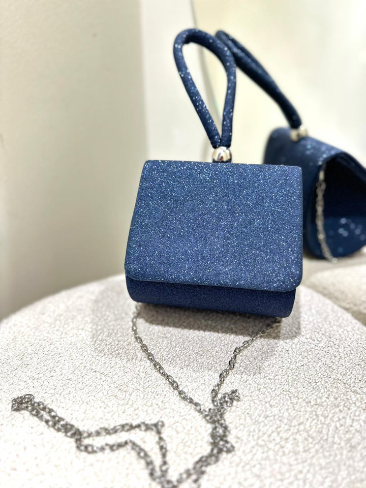 MINI CLUTCH AZUL COM ACABAMENTO CINTILANTE PONTO CHIC