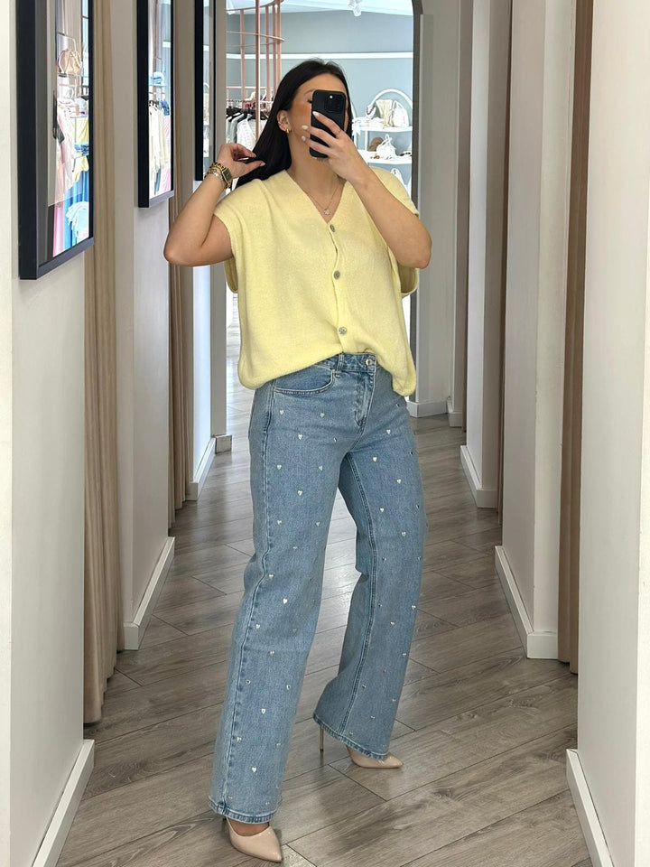 CALÇA DE GANGA COM APLICAÇÕES EM CORAÇÃO PONTO CHIC