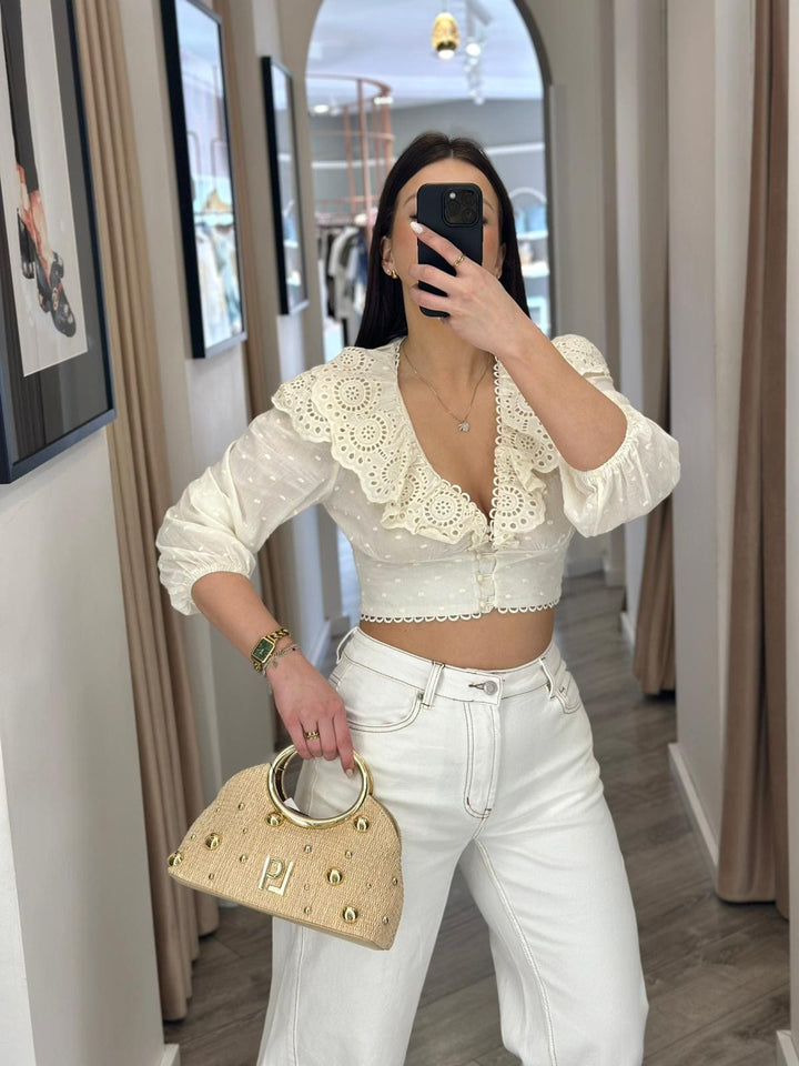 JEANS BRANCA COM COSTURA CONTRASTANTE PONTO CHIC