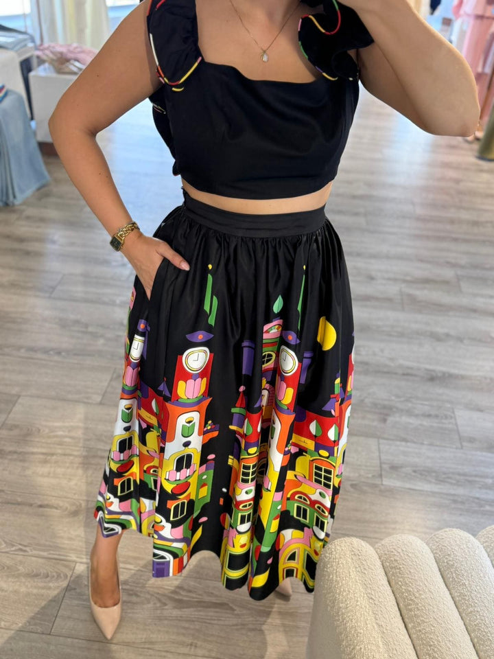 CONJUNTO PRETO COM ESTAMPADO GRÁFICO E MANGAS VOLUMOSAS PONTO CHIC