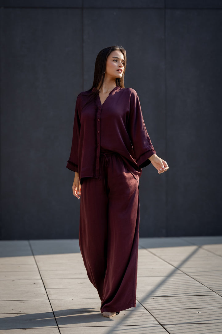 CALÇA BORGONHA COM ELÁSTICO RUGA