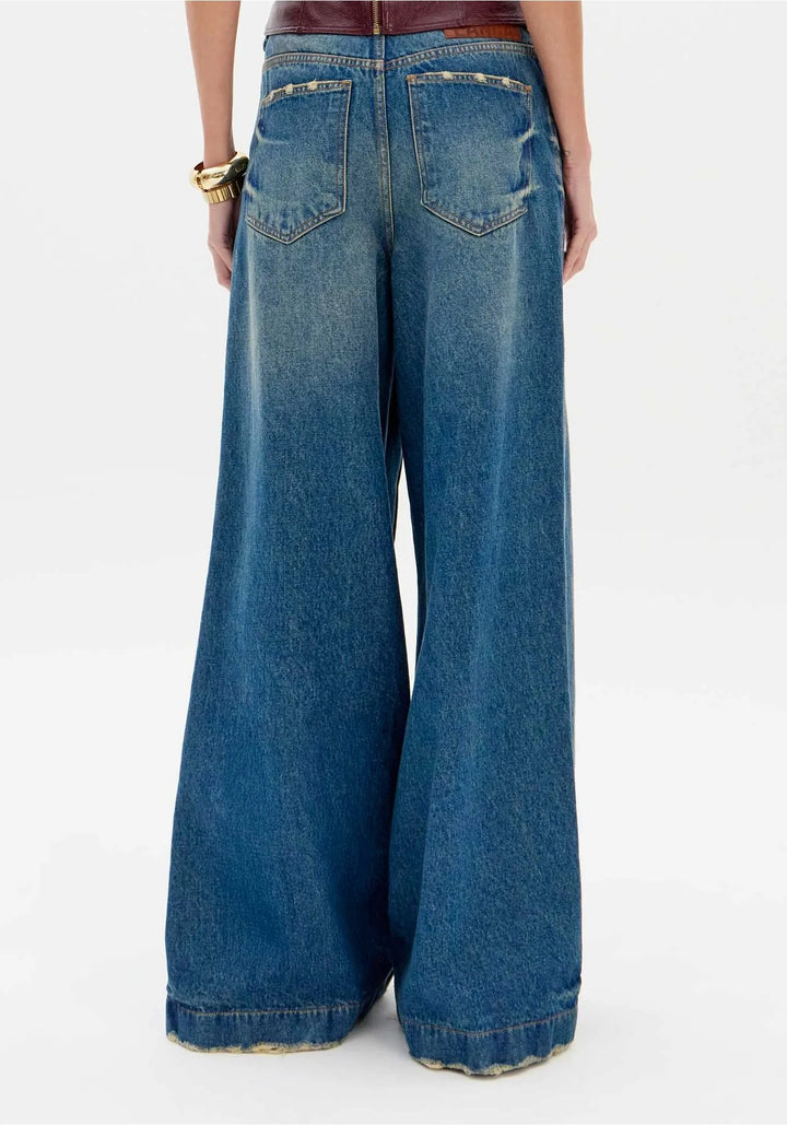 CALÇAS DE GANGA WIDE LEG COM BOTÕES DECORATIVOS LANÇA PERFUME