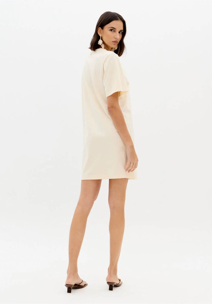 VESTIDO T-SHIRT BEGE COM ESTAMPA FRONTAL LANÇA PERFUME