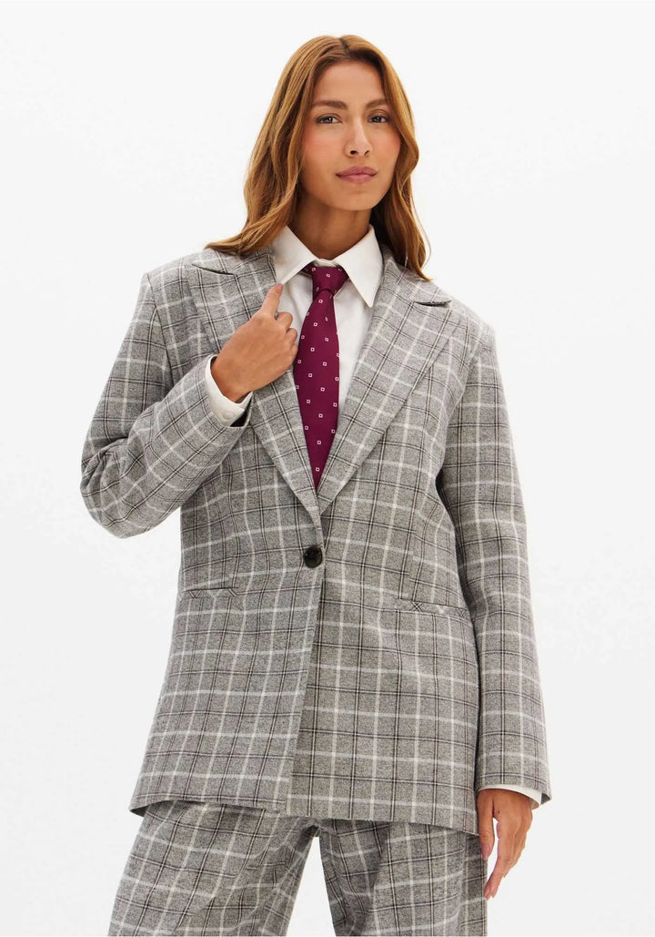 BLAZER CINZA AOS QUADRADOS LANÇA PERFUME