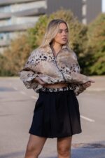 SAIA CALÇÃO PRETA COM CINTO ANIMAL PRINT IMPERIAL