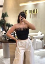 TOP COM PLUMAS NO TOPO DIXIE