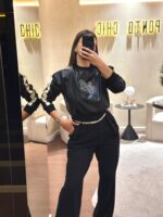 SWEAT EM POLIPELE PRETA COM DETALHES CONTRASTE LANÇA PERFUME