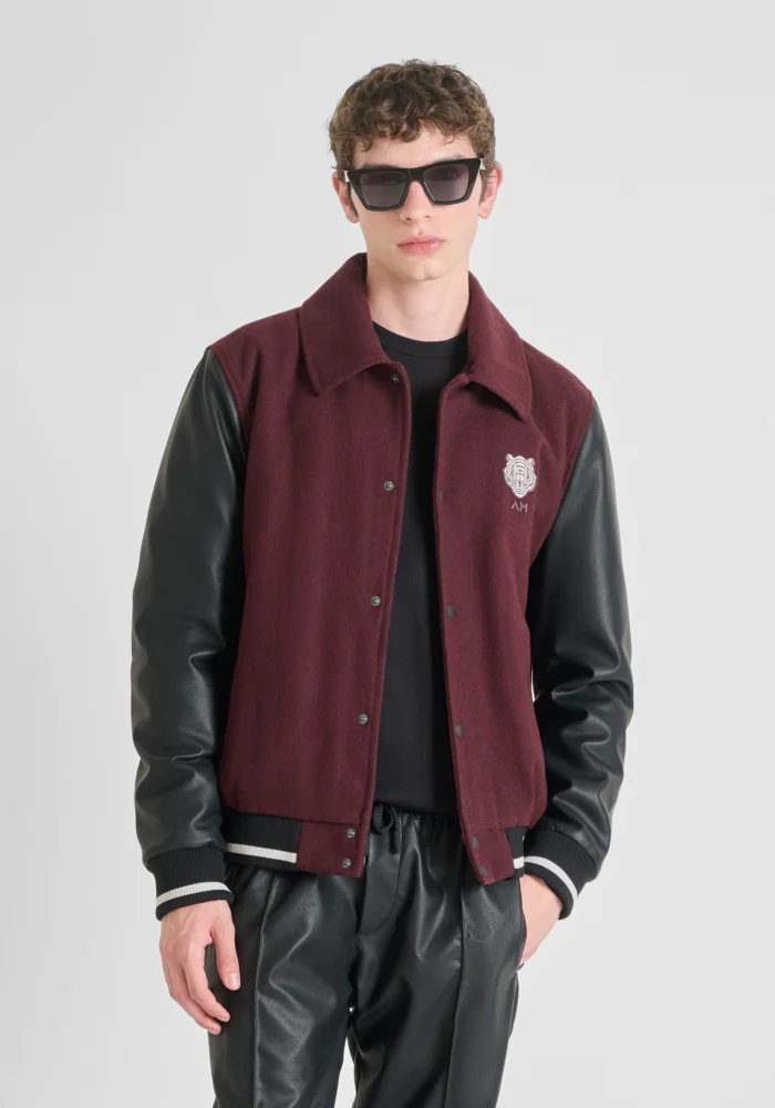 CASACO VARSITY BORDÔ COM MANGAS PRETAS ANTONY MORATO - Image 1