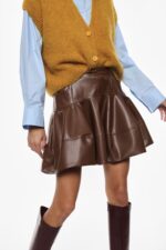 SAIA CURTA CASTANHA EM PELE IMPERIAL