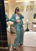 CALÇAS VERDE ÁGUA DE LANTEJOULAS RINASCIMENTO