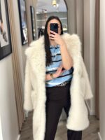 POLO DE MALHA AZUL COM RISCAS EM TONS SUAVES PONTO CHIC