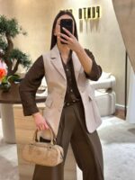 COLETE BEGE COM BOTÕES DOURADOS RINASCIMENTO