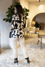 CALÇA BEGE COM CINTURA ELÁSTICA EM CONTRASTE LOCOLUXO - Image 5